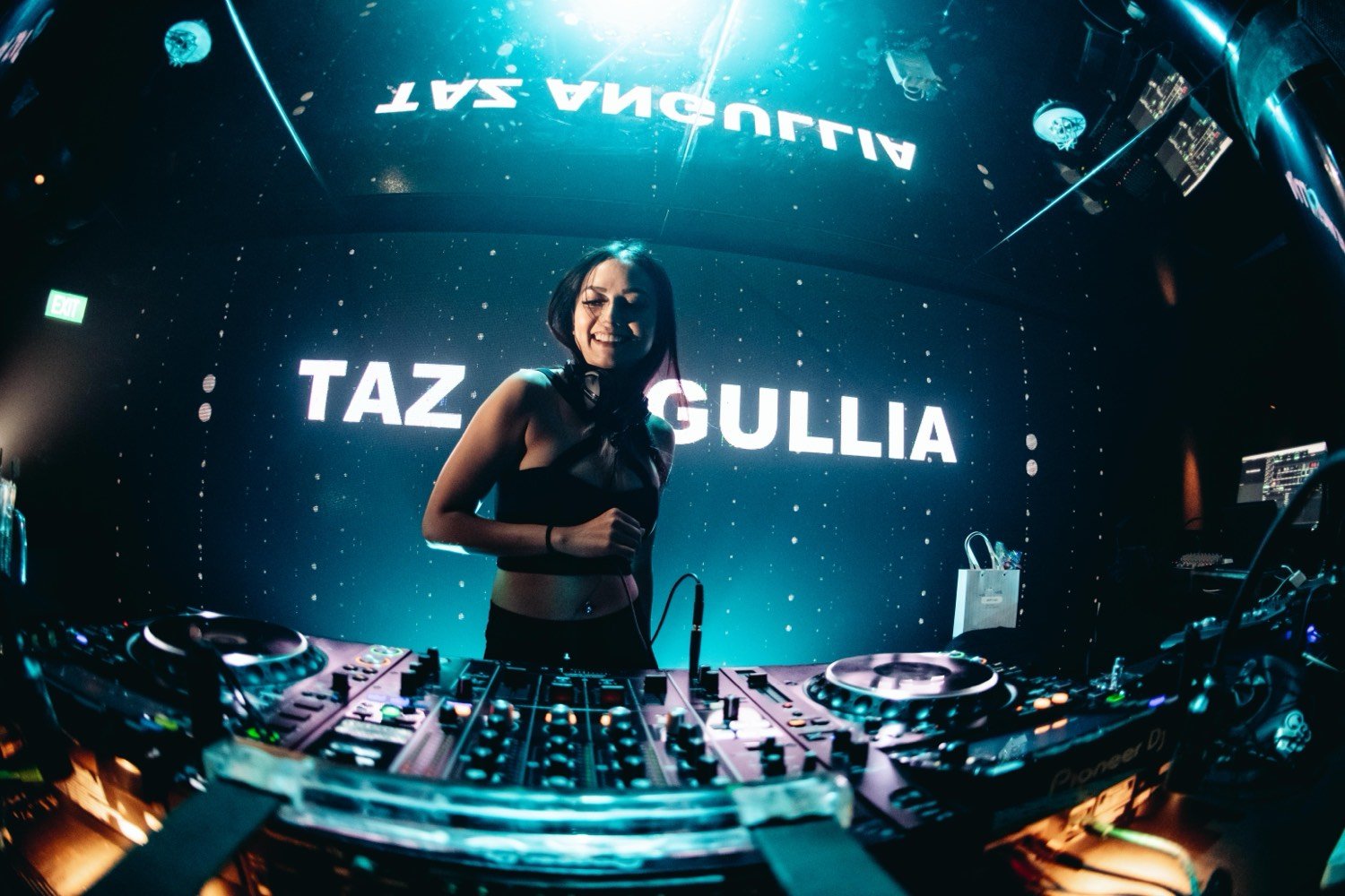 Zouk, Singapore — behind the decks, her name lit across the LED wall